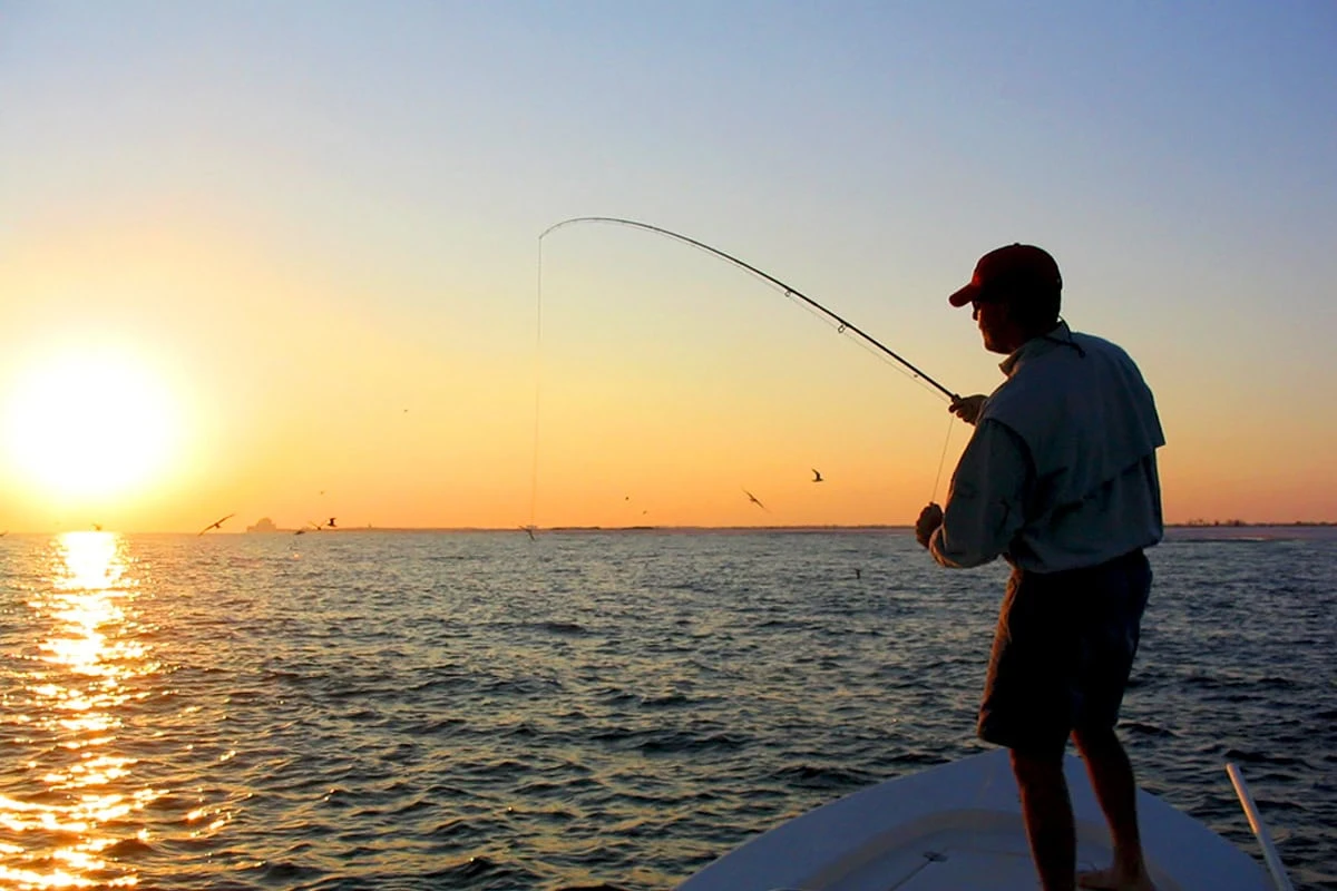 Lake Sevan Guide: Beaches, Sevanavank, Routes, Food & Hotels: Sunset fishing on Lake Sevan